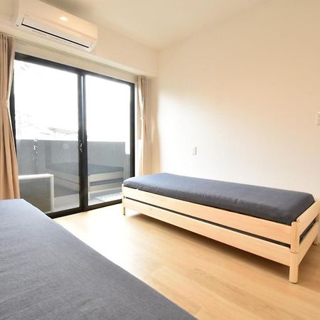 Apartamento Enzo Chidoribashi Osaka Exterior foto